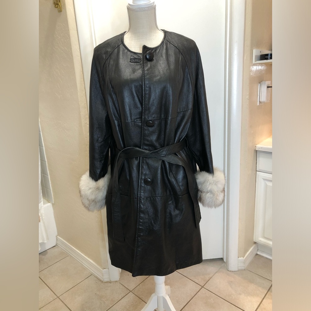 Leather jacket with fur cuffs